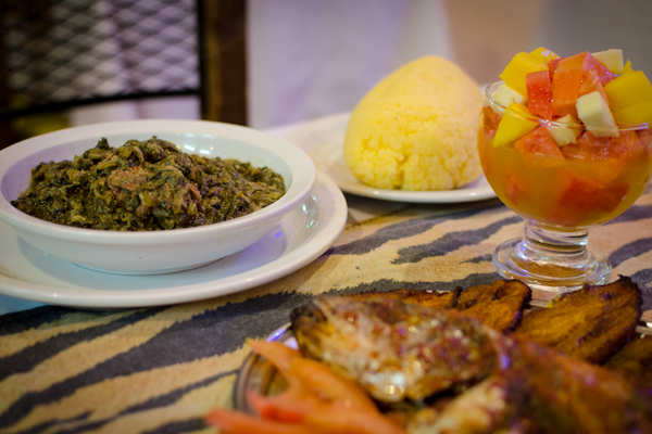 Grilled fish, salsa de acelga, polenta, and fruit salad. (photo - Helena Andell)
