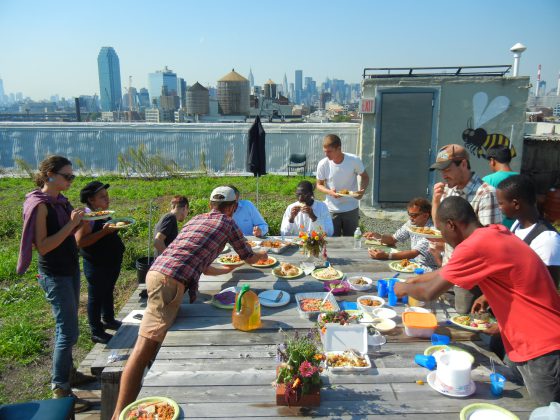RIF participants and Brooklyn Grange staff enjoying lunch together.